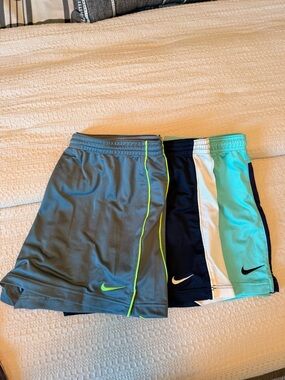 Never worn! Set of 3 women’s Nike shorts. All XL